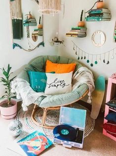 a room filled with lots of different types of furniture and decorations on the wall above