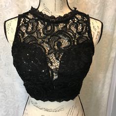 Instantly Become The Center Of Attention And Leave Everyone Speechless When You Enter The Room In This Lacy Black Crop Top With Sequence. New With Tags. Size Xs. Black Crop Top With Built-in Bra For Evening, Backless Black Tops For Night Out, Black Backless Top For Night Out, Backless Black Top For Night Out, Black Backless Top For Evening, Backless Black Top For Evening, Black Fitted Backless Crop Top, Fitted Black Backless Crop Top, Black Crop Top With Built-in Bra For Night Out