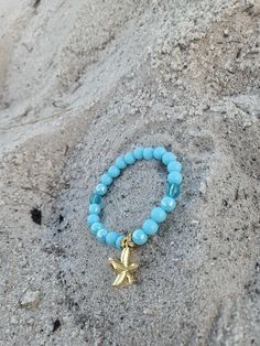 Trendy starfish bracelet brings you at peace with the ocean. Gives you a sense of belonging. 7.5 inches and stone beads used. Turquoise Beaded Bracelets With Starfish Charm, Turquoise Starfish Beaded Bracelets, Ocean-inspired, Ocean-inspired Turquoise Starfish Beaded Bracelets, Ocean-inspired Turquoise Bracelet With Starfish Charm, Turquoise Ocean-inspired Bracelet With Starfish Charm, Turquoise Bracelet With Starfish Charm As Gift, Casual Beaded Bracelets With Starfish Charm, Spiritual Beach Stretch Bracelet, Starfish Charm Bracelet As A Gift