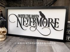 there is a sign that says outh the raven nevermore with a skull next to it