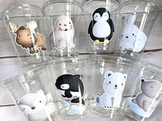 six clear cups with animal stickers on them