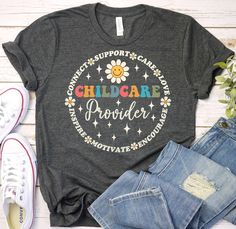 a t - shirt with the words child care on it next to jeans and sneakers