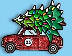 a red car with a christmas tree on the roof and number twenty in front of it