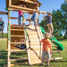 children climbing up and down a wooden play structure