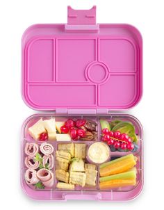 a pink lunch box filled with lots of food