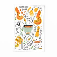 a tea towel with an illustration of pumpkin soup and other things on it, including oranges