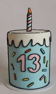 a blue birthday cake with a candle on it's top that reads 13 1 / 2