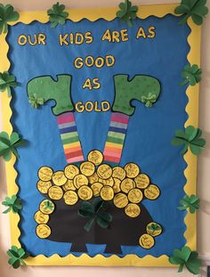 a bulletin board with shamrocks on it and the words, our kids are as good as gold