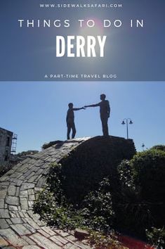 two people holding hands on top of a hill with the words things to do in derby