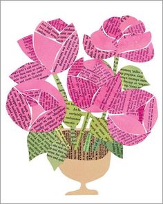 a vase filled with pink flowers on top of a white table next to a book page