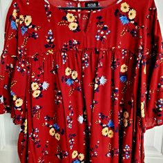 Only Worn Once. Very Cute Flower Babydoll Top W/ Studded Accents. Can Wear With Jeans, Shorts, Or Capris. Measurements: Across Bust: Approx 25" Length: Approx 23.5" Sleeves: Approx 12.5" Cute Red Floral Print Tops, Flowy Red Floral Print Top, Red Flowy Short Sleeve Blouse, Babydoll Top, Burgundy Red, Baby Dolls, Womens Tops, Red, Women Shopping