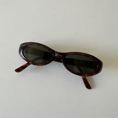 These chic cat eye sunglasses are your everyday classic. Featuring a brown tortoise frame with black smoke lens. This style is unisex. True genuine vintage sunglasses from the 90s.  - 400 uv  - new vintage from the 90s - includes sunglasses pouch Affordable Brown Cat Eye Sunglasses, Sunglasses 90s Vintage, Cute Sunglasses Aesthetic, Trendy Sunglasses 2024, 90 Sunglasses, Tiny Sunglasses, Channel Sunglasses, Glasses Sun