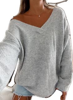 Knit V-neck Sweater With Ribbed Cuffs, Oversized V-neck Sweater With Ribbed Cuffs, Trendy Gray Long Sleeve V-neck Sweater, Oversized V-neck Sweater For Fall, Gray V-neck Sweater For Fall, Cozy Ribbed V-neck Long Sleeve Sweater, Fall Chunky Knit V-neck Sweater, Chic Gray V-neck Sweater, Acrylic V-neck Sweater For Winter