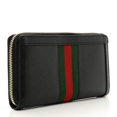 This is an authentic GUCCI Calfskin Web Ophidia Zip Around Wallet in Black. This stylish wallet is crafted of Gucci GG monogram coated canvas with a green and red web stripe and black trim. This wallet features a wrap-around gold zipper in gold and opens to a back leather and fabric interior with card slots and a zipper compartment. Red Web, Gg Monogram, Green And Red, Gold Zipper, Black Trim, Card Slots, Zip Around Wallet, Calf Skin, Slots