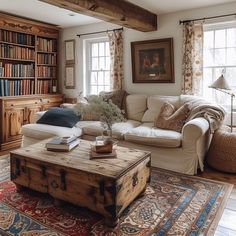 a living room filled with furniture and bookshelves