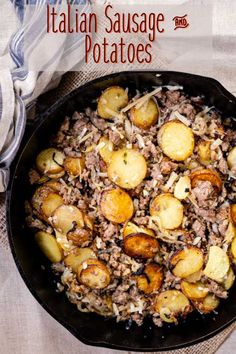 an iron skillet filled with cooked potatoes and ground beef in italian sausage seasoning