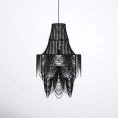 a black chandelier hanging from the ceiling