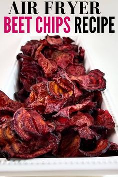 an air fryer beet chips recipe in a white dish with the title above it