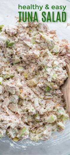 tuna salad in a glass bowl with a wooden spoon on the side and text overlay that reads healthy & easy tuna salad