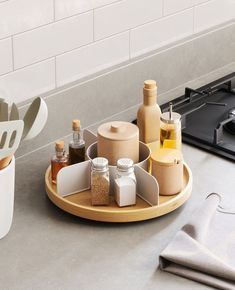 the kitchen counter is clean and ready to be used as a holder for condiments