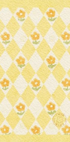 a yellow and white checkered pattern with flowers on it