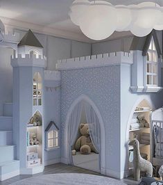 a child's bedroom with a castle bed and stuffed animals in the closets