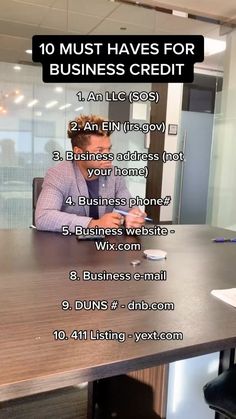 a man sitting at a desk with the words 10 must haves for business credit