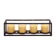 three candles are sitting in a metal holder with four lit candles on top of it