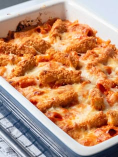 a casserole dish filled with meat and cheese