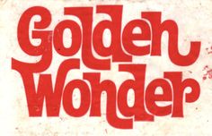 the title for golden wonder, written in red and white on a dirty paper background