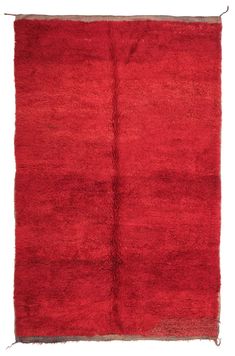 a red area rug on a white background