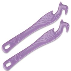 two purple plastic spoons sitting next to each other