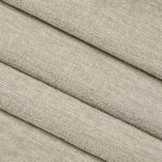 a close up shot of the fabric material for curtains and drapes in light beige