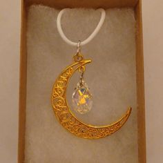 Handmade Moon And Teardrop Necklace. Made With Antique Yellow Gold Moon 40mm Iridescent Moonlight Aurora Crystal Teardrop 16mm Adjustable White Cord Chain With Claw Clasp. Birthstone Choice: April Box Included Free. New Unused Item. Accepting Reasonable Offers. Gold Moon, Teardrop Necklace, Crescent Moon, Crystal Necklace, Crescent, Womens Jewelry Necklace, Birthstone, Aurora, Jewelry Necklaces