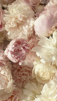 pink and white flowers are arranged together