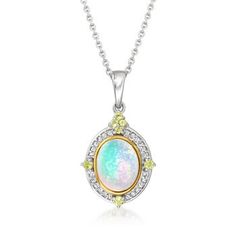 Ross-Simons - Ethiopian Opal, .10ct t.w. Diamond, .10ct t.w. Peridot Pendant Necklace, 14kt Gold. 20". Indulge in the beautiful color play of opal. This pendant necklace features an 8x10mm oval Ethiopian opal cabochon highlighted by .10 ct. t.w. round brilliant-cut diamonds and .18 ct. t.w. round peridots. Set in polished sterling silver with 14kt yellow gold circling the opal. Suspends from a cable chain. Lobster clasp, peridot, diamond and Ehiopian opal pendant necklace. Peridot birthstones ar Silver Ethiopian Opal Pendant Jewelry, Ethiopian Opal Oval Pendant, Ethiopian Opal Oval Pendant With Gemstone, Hallmarked Ethiopian Opal Pendant Jewelry, Ethiopian Opal Cabochon Oval Pendant Jewelry, Peridot Birthstone, Peridot Pendant, Turquoise Drop Earrings, Opal Pendant Necklace