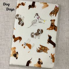 a white cloth with dogs on it