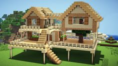 an image of a house made out of wood in minecraft with stairs leading to it