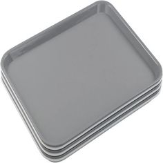 three square trays stacked on top of each other with one empty pan in the middle