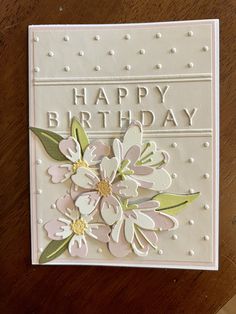 a handmade birthday card with flowers on it