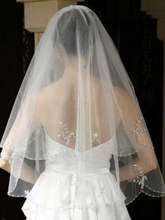 the back of a bride's wedding veil