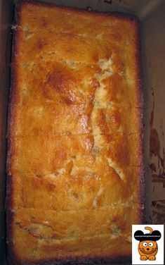 a close up of a square cake in a pan