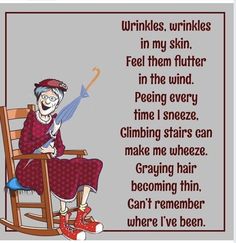 a woman sitting in a rocking chair with an umbrella on her head and the words wrinkles, wrinkless, in my skin feel them further in the wind