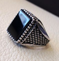 Rectangular silver aqeeq flat natural black onyx semi precious agate gemstone men ring sterling silver 925 jewelry all sizes fast shipping Risk free Quality guarantee policy : If you are not satisfied with your item for any reason simply send it to us and you will get a replacement or refund . please write or choose your size with the order and we will size it for you . Our ring is handcrafted mostly with a few simple tools . but some methods are used in casting like lost wax method . sterling s Fine Jewelry Onyx Silver Ring, Silver Onyx Ring Fine Jewelry, Luxury Silver Onyx Rings, Classic Onyx Ring Jewelry, Classic Onyx Ring, White Gold Onyx Ring With Gemstone, Silver Sterling Signet Ring With Rectangular Stone, Gift Black Agate Ring, Black Jewelry With Polished Edges For Gift