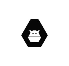 an animal with a crown on its head sitting in a hexagonal shape logo