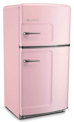 an old fashioned pink refrigerator with two doors