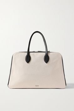 This large 'Weekender' version of Khaite's chic and minimal 'Maeve' tote is sized to fit all you need for a quick 48-hour trip. It's made from leather and canvas in a structured, boxy shape and has sturdy top handles. Canvas Leather Tote, Leather Duffel Bag, Leather Weekender Bag, Leather Weekender, Leather Duffel, Large Leather Tote Bag, Suede Tote, Leather And Canvas, Large Leather Tote