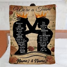 a blanket with two silhouettes holding hands and the words we're a team on it