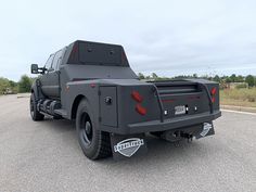 an armored vehicle is parked on the side of the road