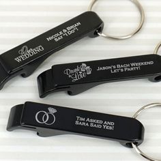 three personalized keychains are shown on a white surface with the words, wedding and marriage date printed on them